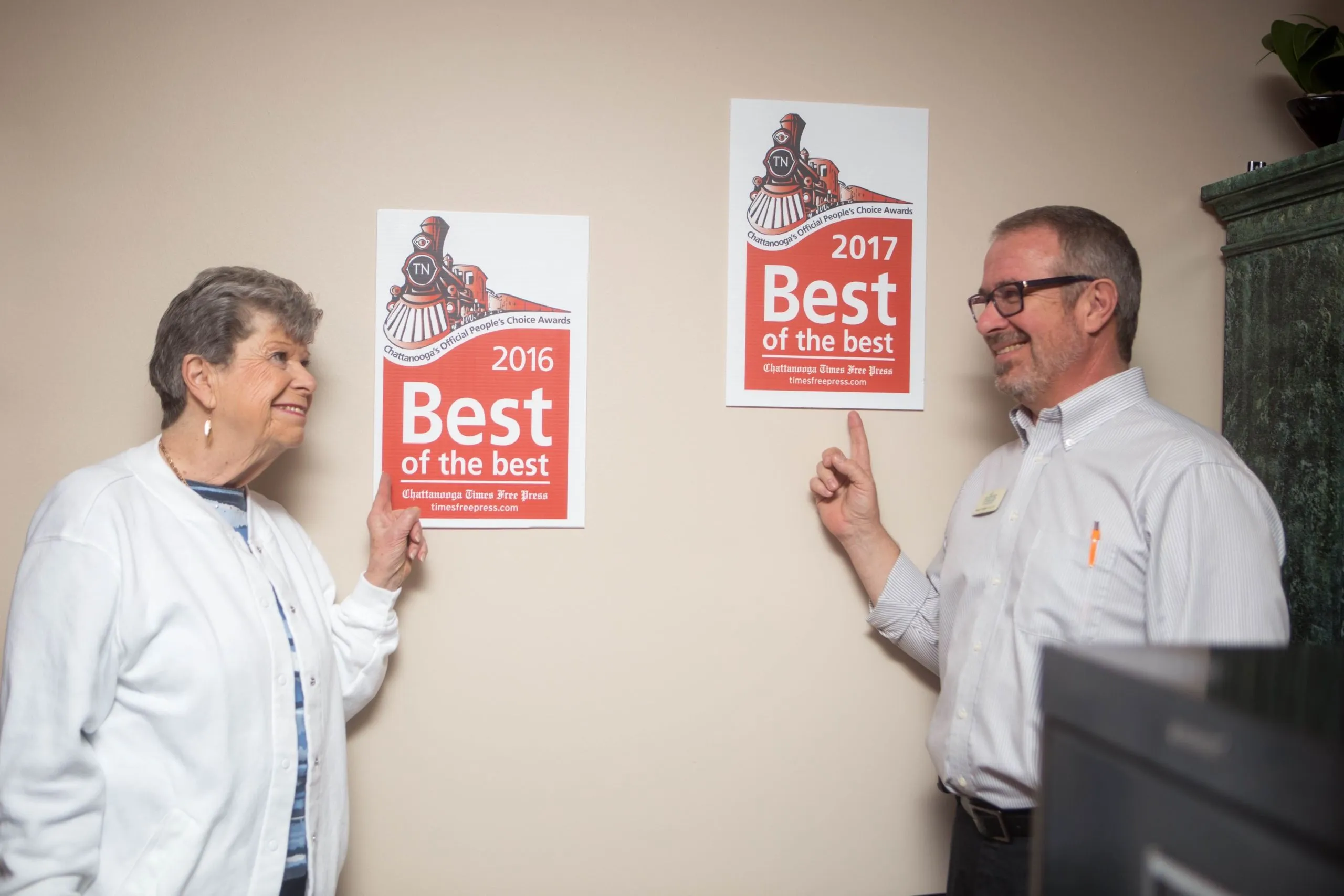 Scott Ingell, BS, LMT, owner of Focus 4 Massage, with the studio's Best of the Best awards