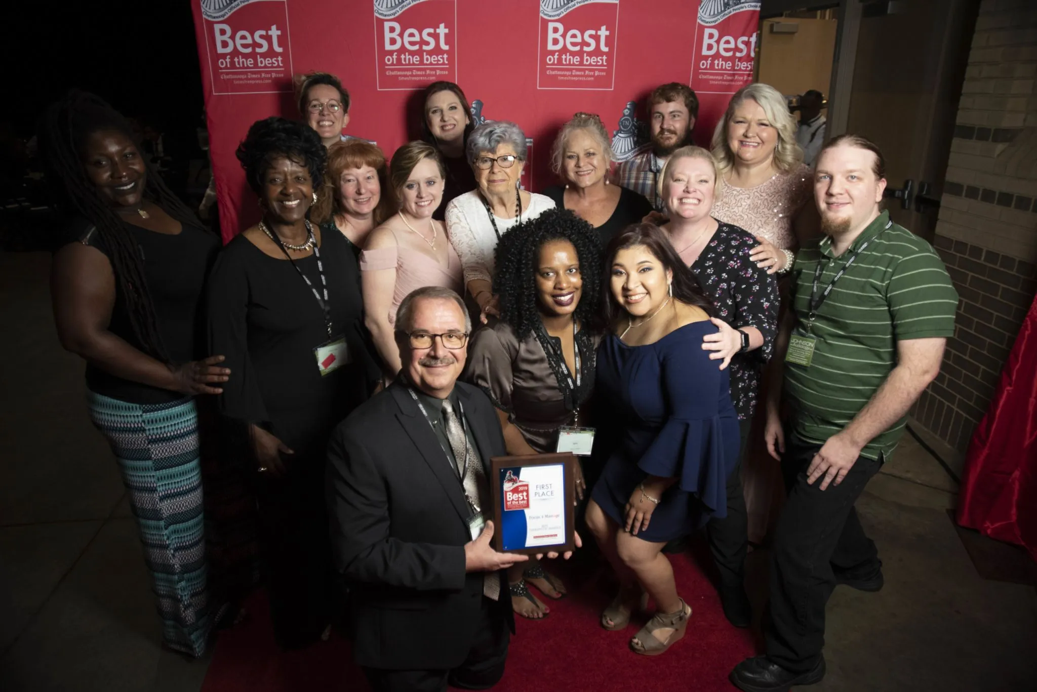 The Focus 4 Massage team accepting a Chattanooga Best of the Best award